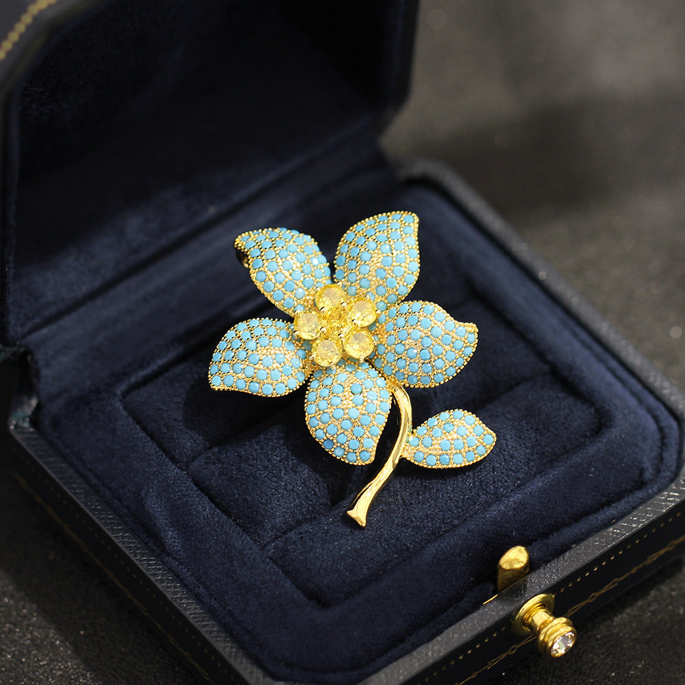 Premium blue stone inlaid cubic zirconia brooch pin for women, durable coat brooch, exquisite wedding jewelry and top pick of women fashion jewelry gift for her.