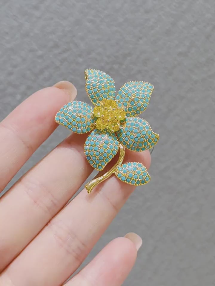 Sparkling cubic zirconia blue stone brooch pins for women, versatile coat brooch accessory, trendy cz brooch ideal wedding jewelry and thoughtful gift for her.XXB0017